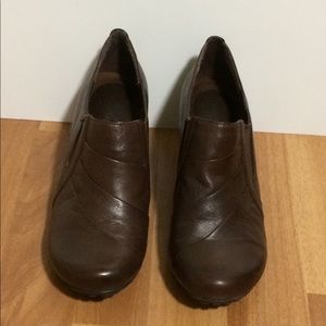 Brown leather booties.